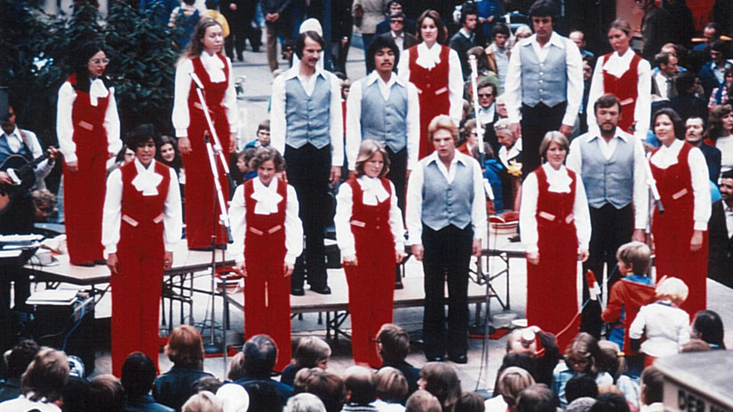 Smith and Company wearing red outfits